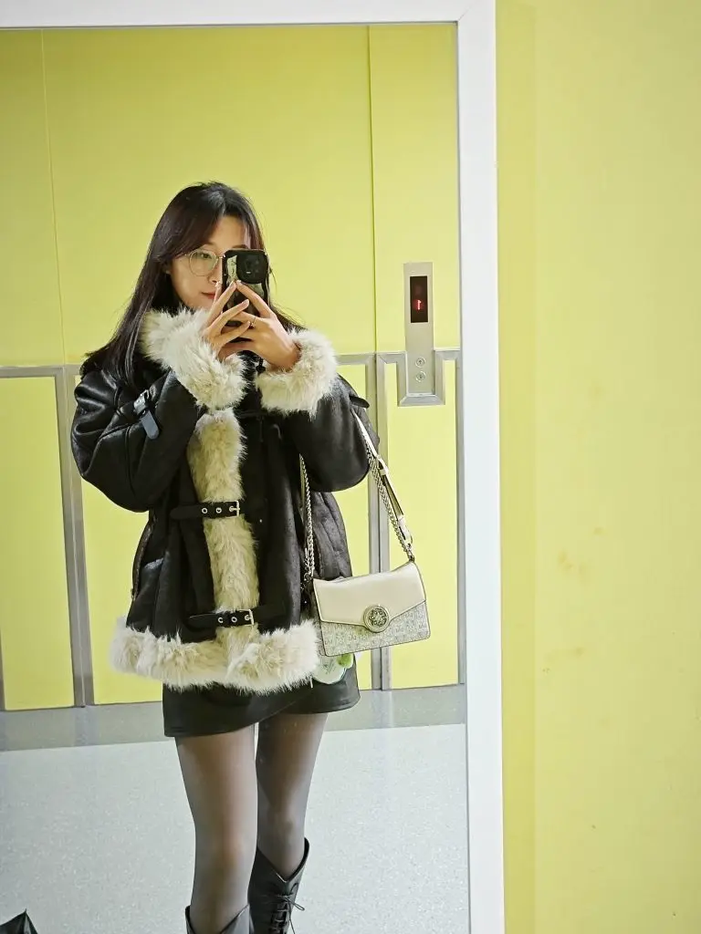 [伊尚轻淑女装]不规则pu皮裙半身裙女秋冬季高腰包臀裙防走光a字短裙子